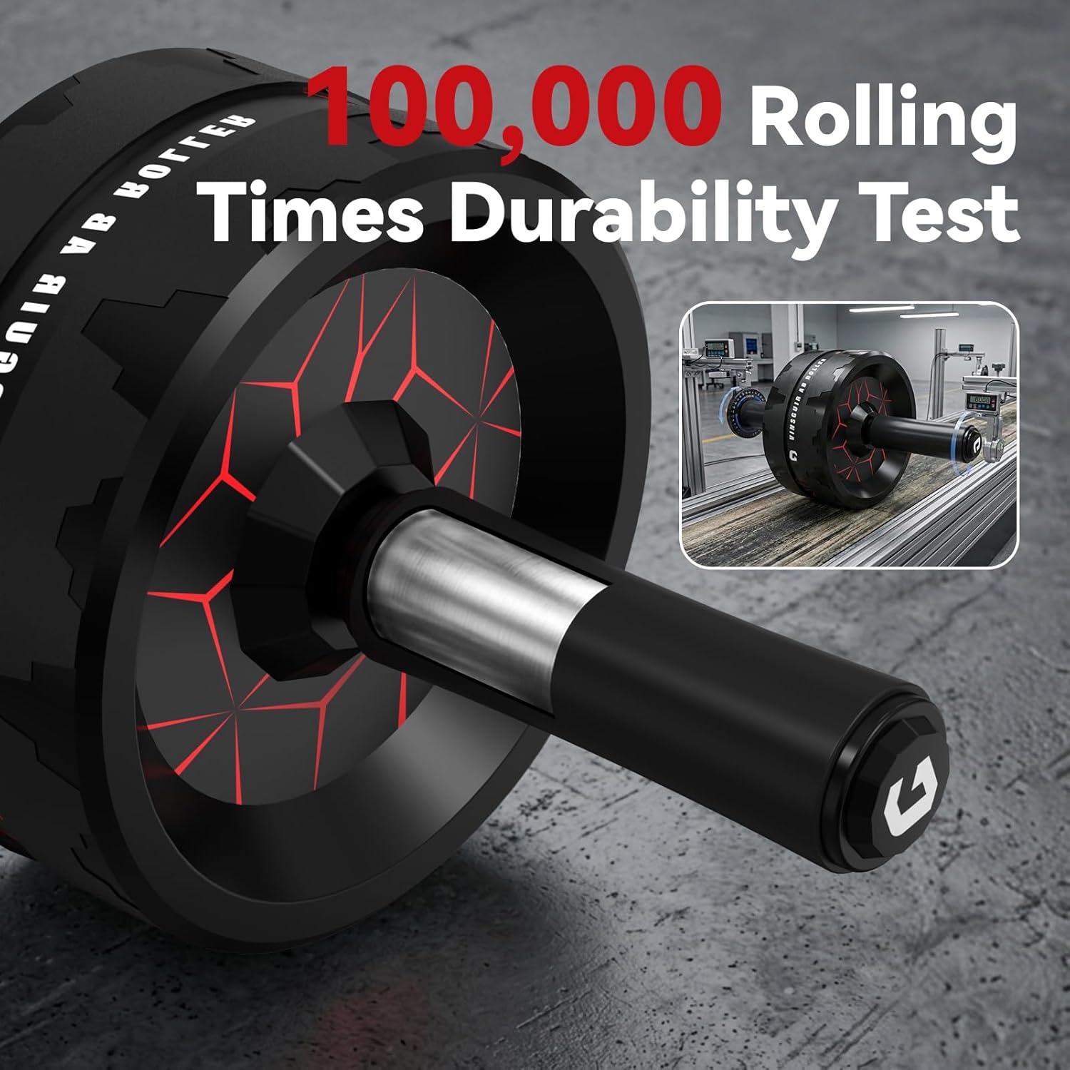 Black ab roller with red accents on a gray surface, featuring durability test text.
